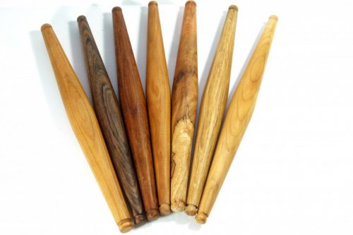 handmade wooden tapered pins in selection of woods