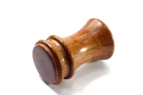 Wooden handmade palm gavel in Tasmanian Myrtle, tall, elegant with interesting almost two tone grain. Great for auctioneers on the move, this ergonomically designed wooden palm gavel sounds good, looks good and feels good and fits in the pocket.  Excellent and unusual grain in this particular palm gavel. Designed and made by me not mass produced, each of my palm gavels is different, unique and beautifully finished with beeswax polish to let the natural colour of the wood shine through, a great wooden gift or wooden present for a mason's apron pocket, an auctioneer, Best Man or toastmaster and anyone that appreciates the unique richness and quality of the grain and colours of natural finely crafted wooden items. Size Size is approximately 78mm or 2 and 7/8ths" tall and weighs 3.4 ozs or 89gs. Care Instructions Best kept out of direct sunlight. Dust and polish occasionally with beeswax to be rewarded with a deep shine. Dispatch All items are carefully packaged to ensure they reach you safely and have labels and care instructions, gift ready and dispatched next working day 1st class post, or airmail and for overseas customers the purchaser will be responsible for paying any duties where these apply and the relevant documentation will be sent with the item.