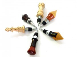 Selection of jumbo wine stoppers with chrome and acrylic stopper