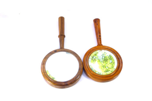 Handheld mirrors with wooden surrounds